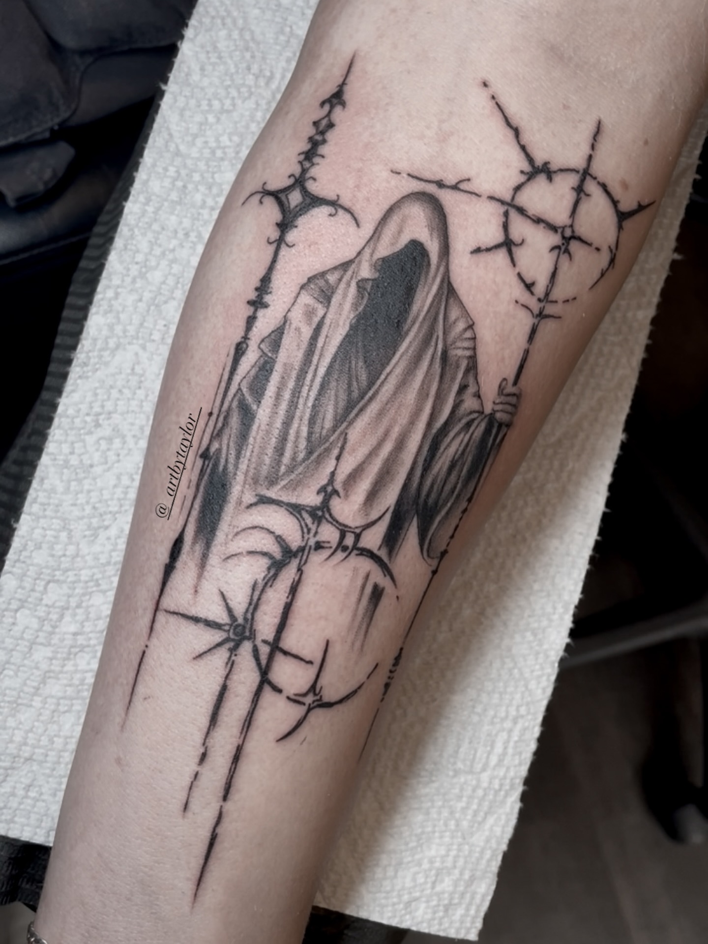 Reaper black and grey tattoo on the forearm by Taylor✍🏽️