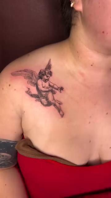 Cherub realism tattoo by Nick Ochoa