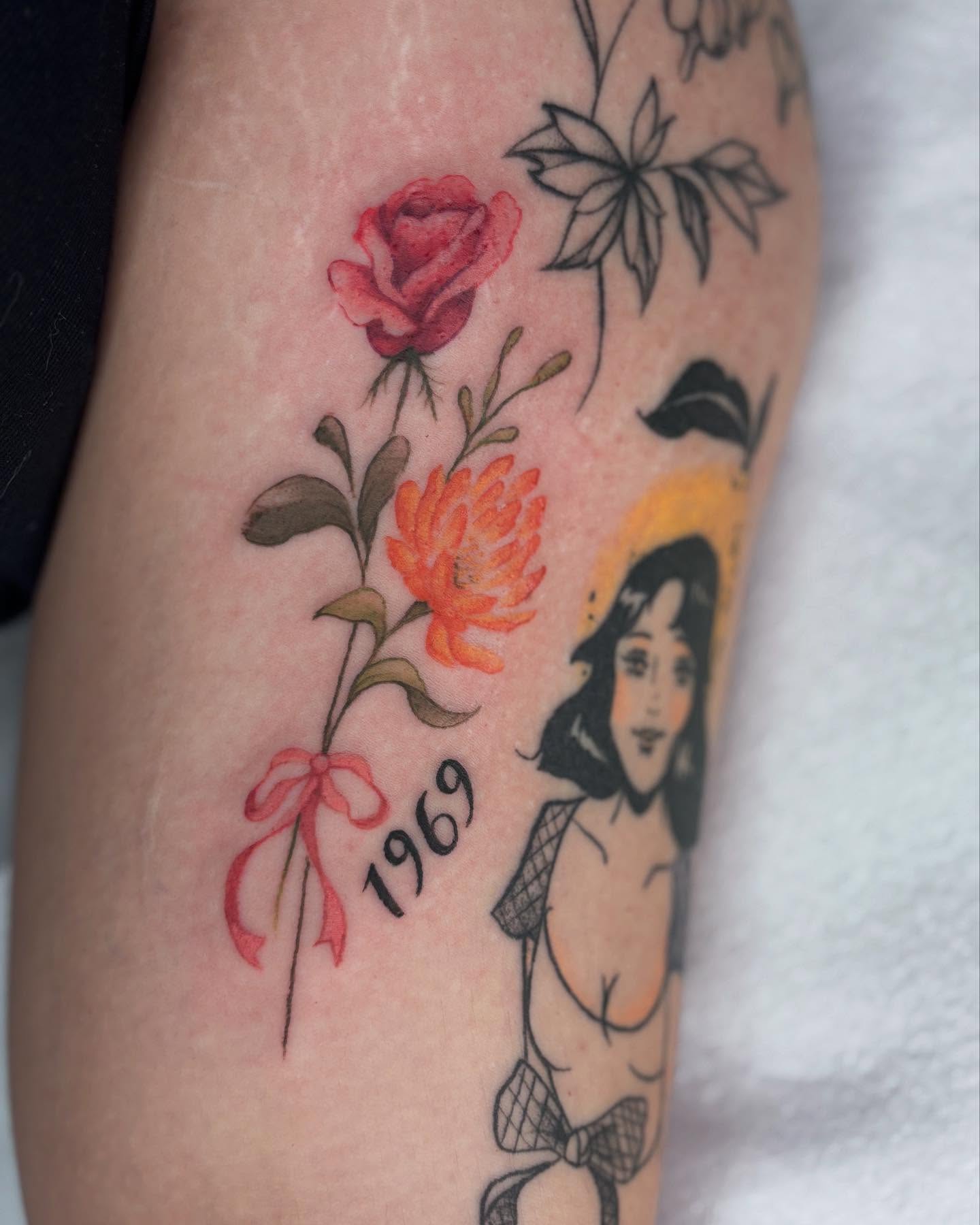 Floral bouquet and woman American traditional tattoo on the forearm by π»πΈπ½π½, Ypsilanti, Michigan