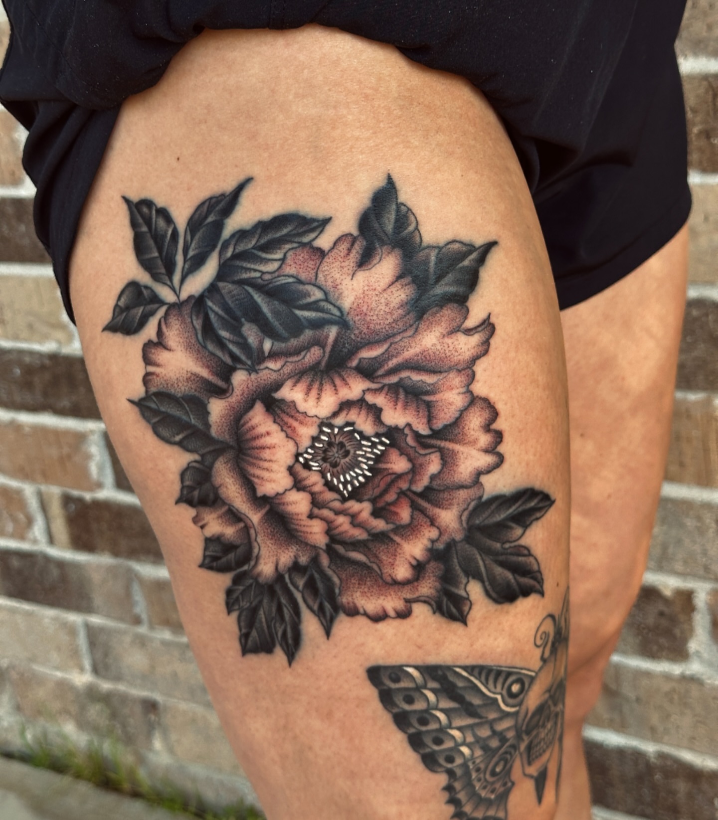 Peony black and grey tattoo on the thigh by Matthew, Georgetown, Texas