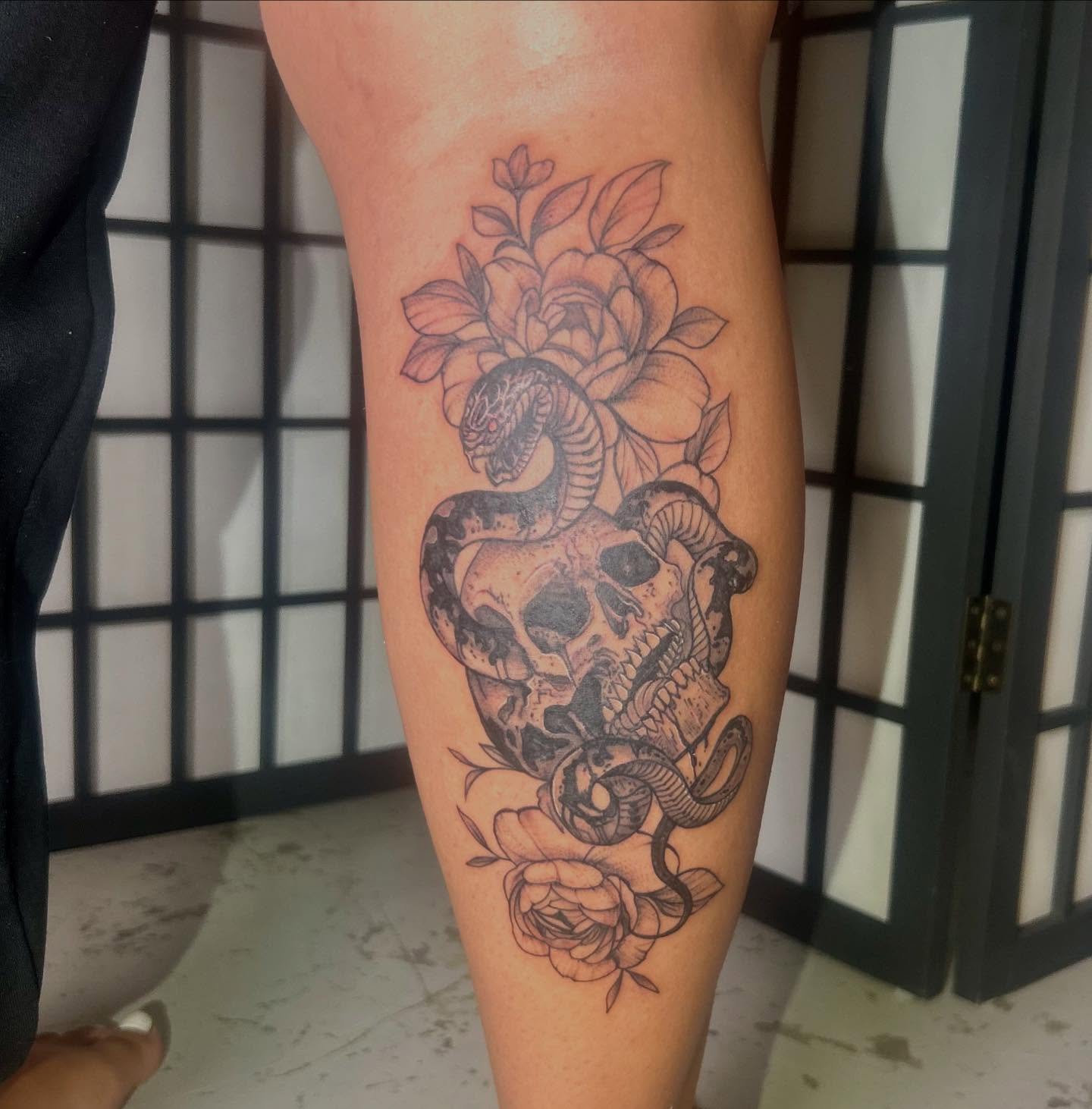 Snake and skull realism tattoo on the forearm by ɢɢ sᴛʏʟᴇs