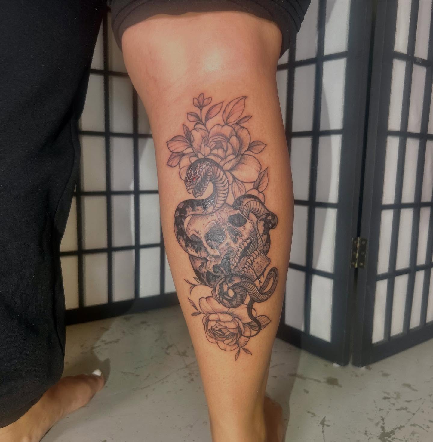 Snake and skull realism tattoo on the calf by ɢɢ sᴛʏʟᴇs
