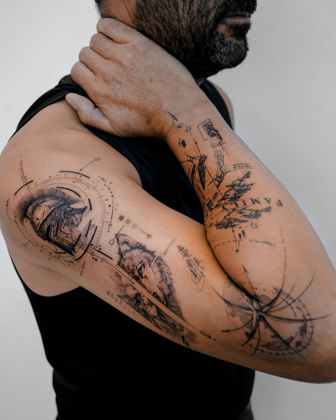 Wolf geometric tattoo on the upper arm by Yeonji