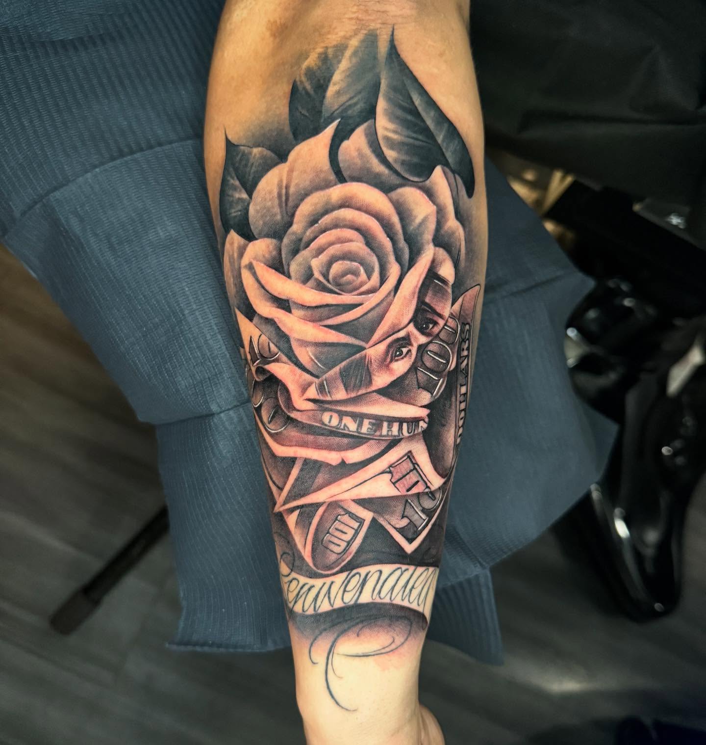 Rose and banner American traditional tattoo on the forearm by Keith (KAM) Miller