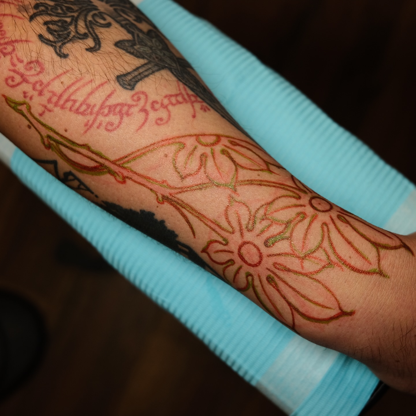 Floral design ornamental tattoo on the forearm by Tony Talbert, Fredericksburg, Virginia