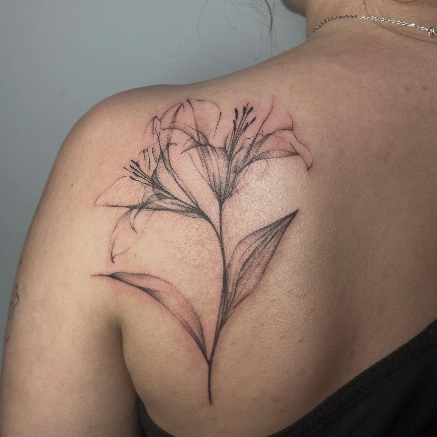 Lily black and grey tattoo on the shoulder by ๐๐๐๐ ๐๐๐๐