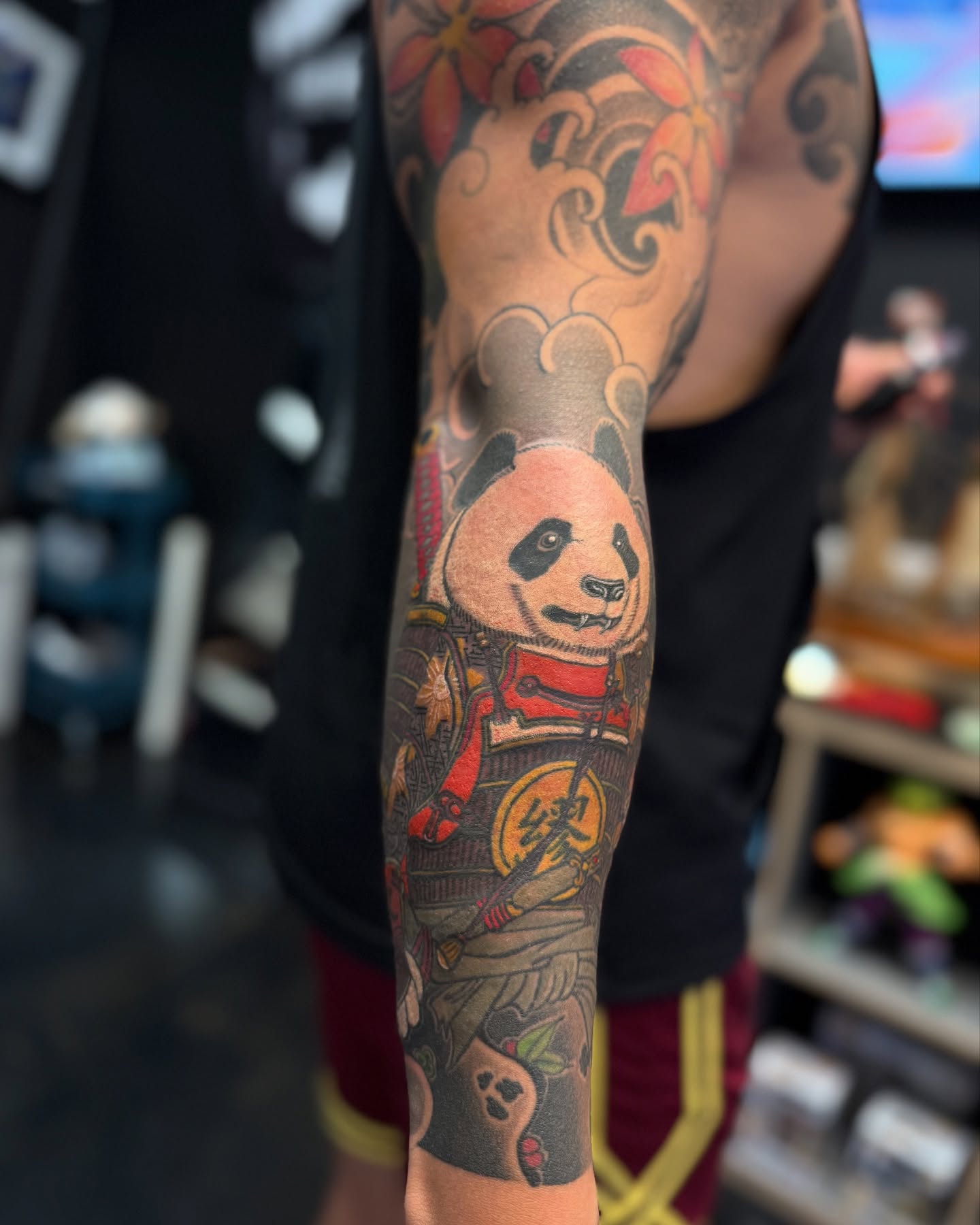 Panda in samurai armor japanese irezumi tattoo on the forearm by Zack Yang, Houston, Texas