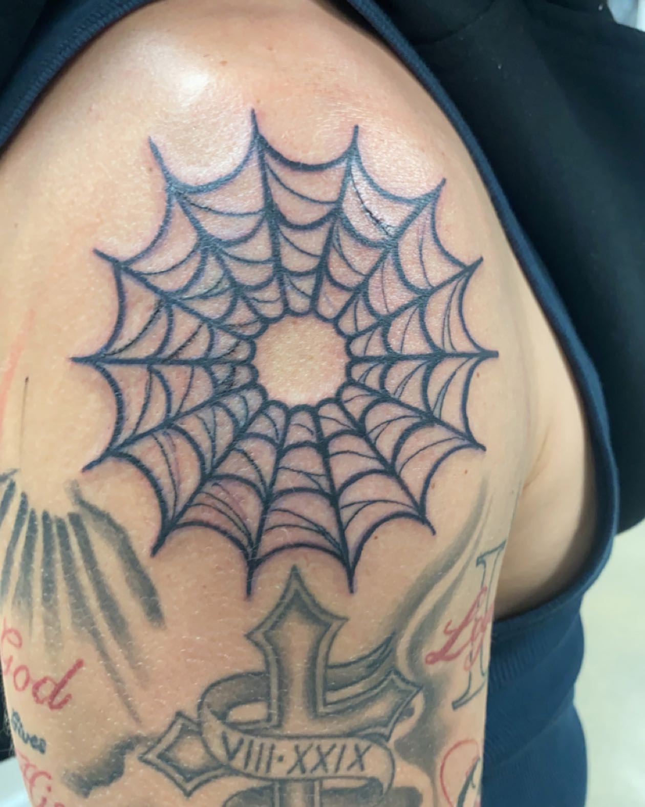 Spider web black and grey tattoo on the shoulder by Tattsruru