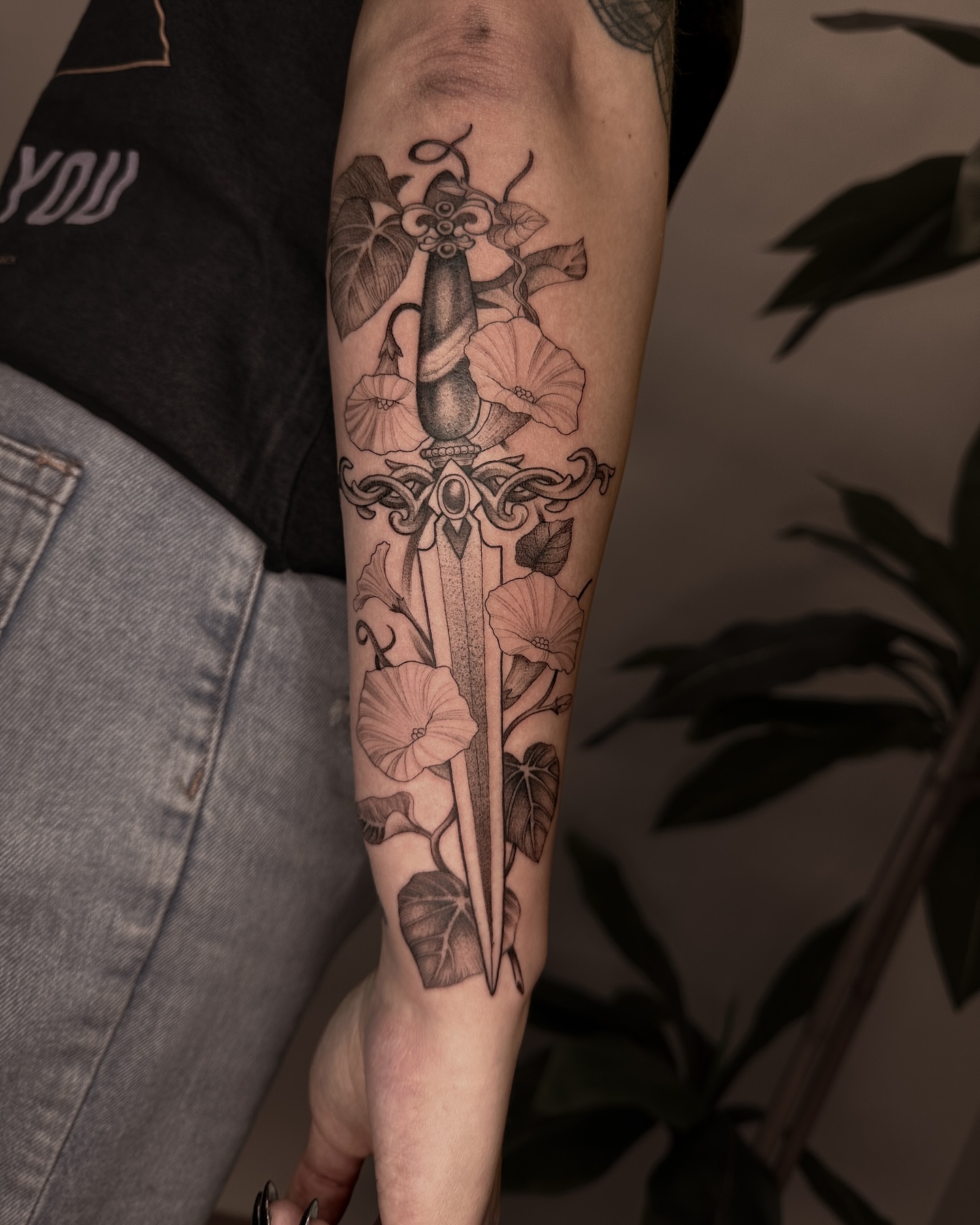 Sword and flowers black and grey tattoo on the forearm by James Hix - Tattoo Artist, Fort Worth, Texas