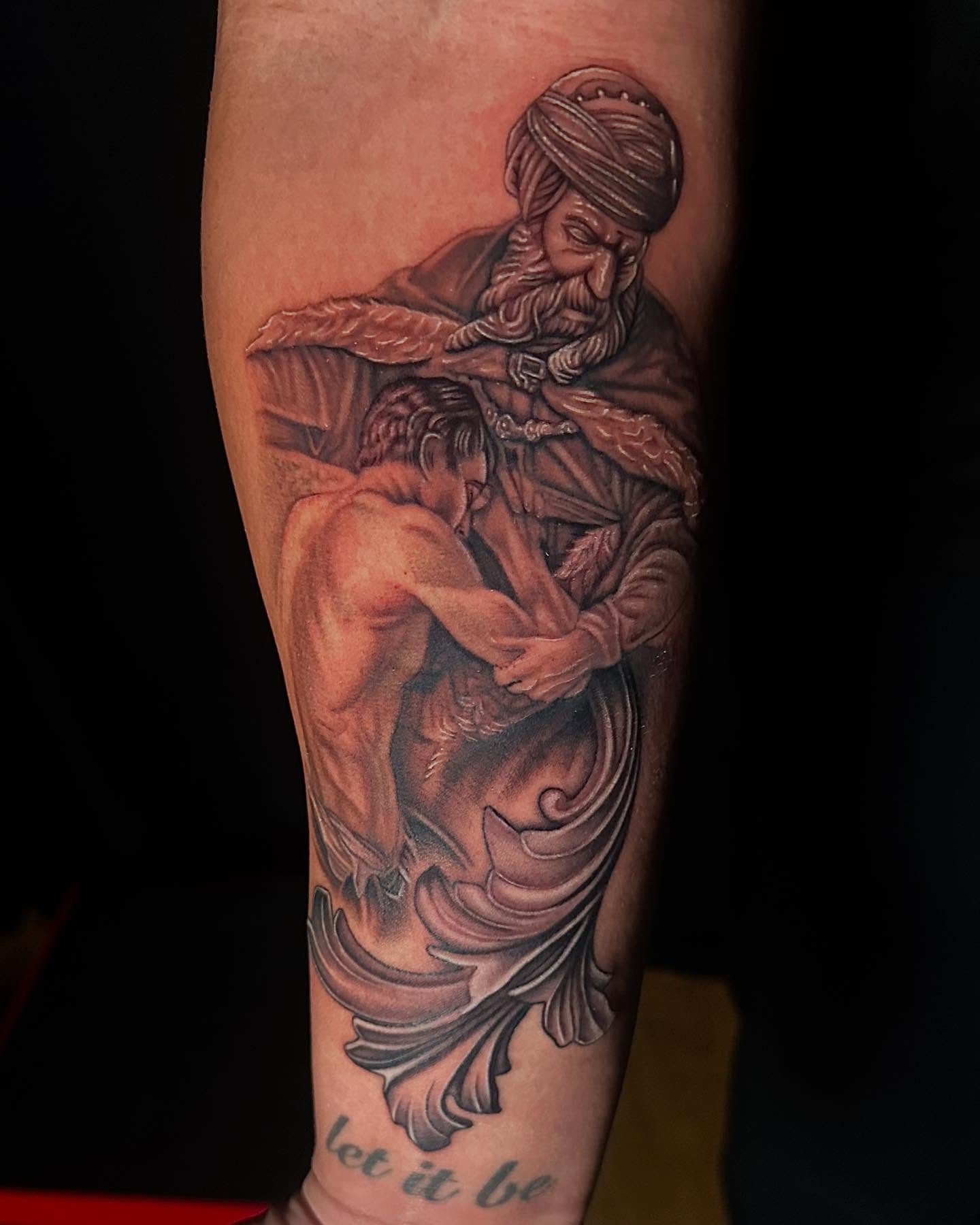 Father and son realism tattoo on the forearm by Jon Gioia