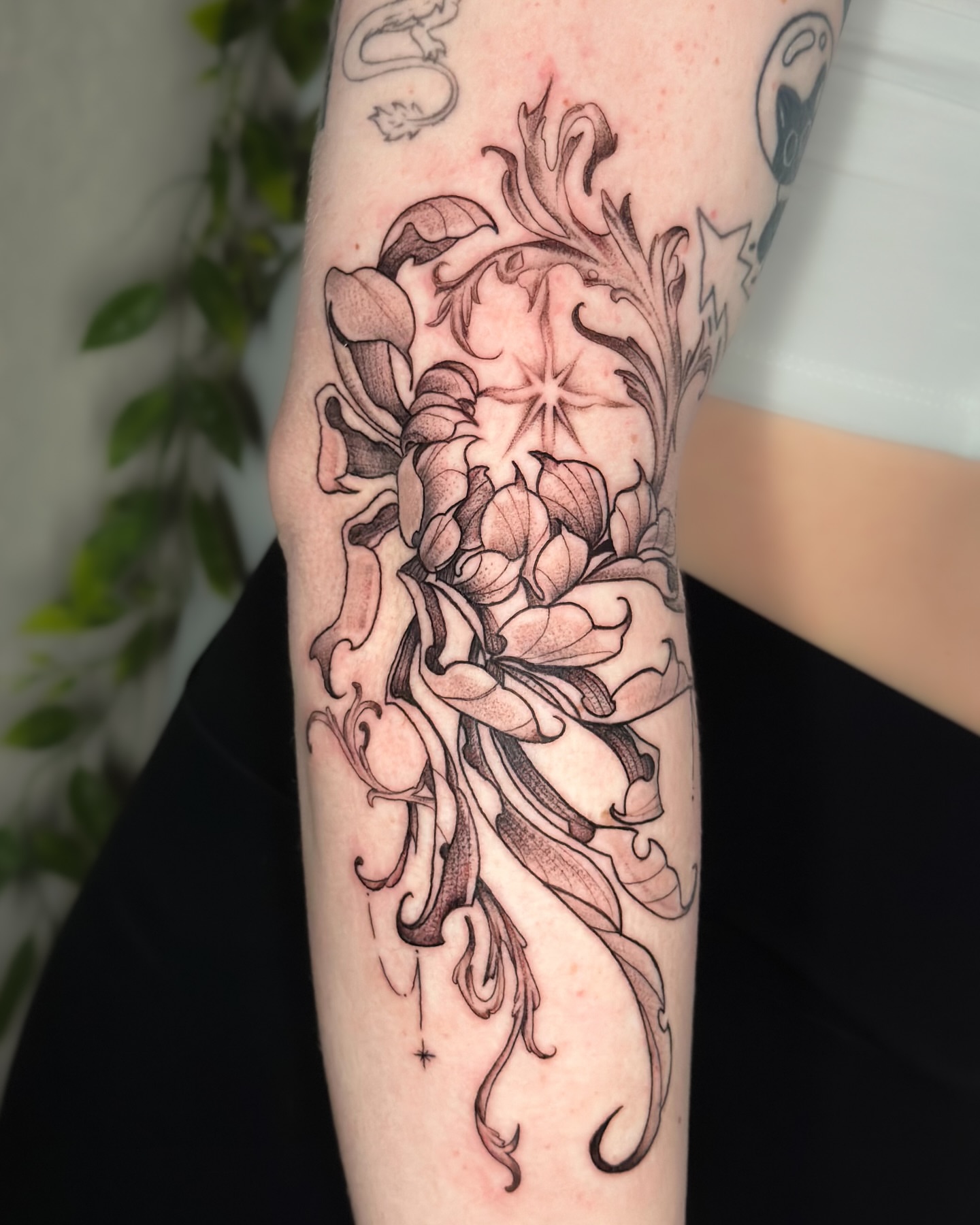 Floral design ornamental tattoo on the forearm by zoe mars