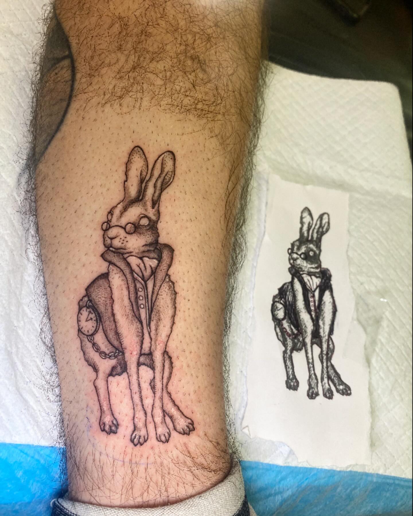 Rabbit in suit realism tattoo on the forearm by Tyla Pistak, Seattle, Washington
