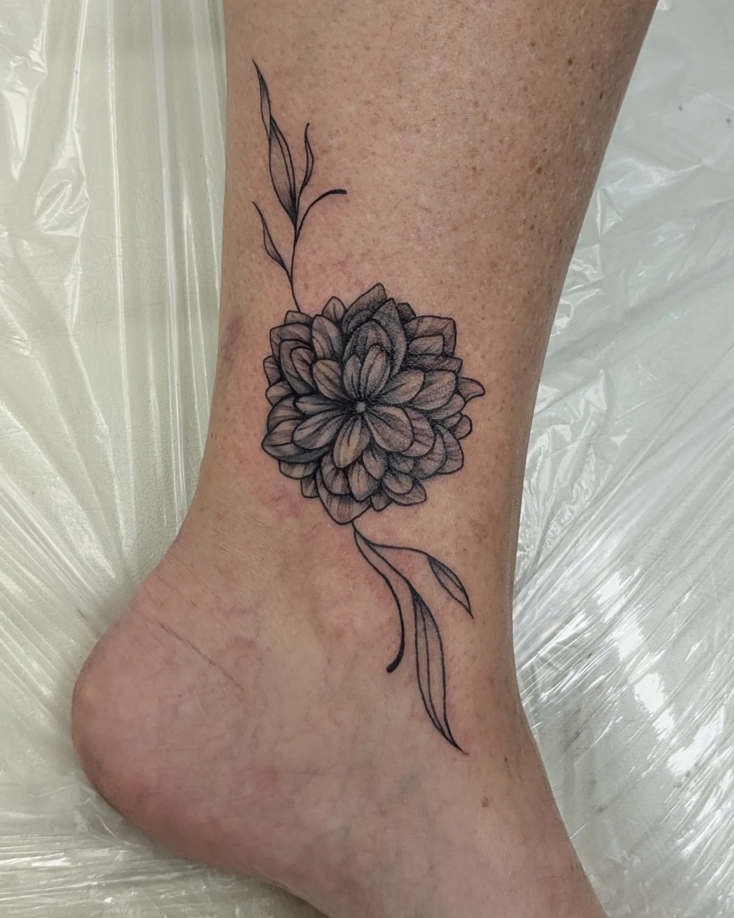 Flower black and grey tattoo on the foot by ⁘ heléna tupou-lisle ⁘