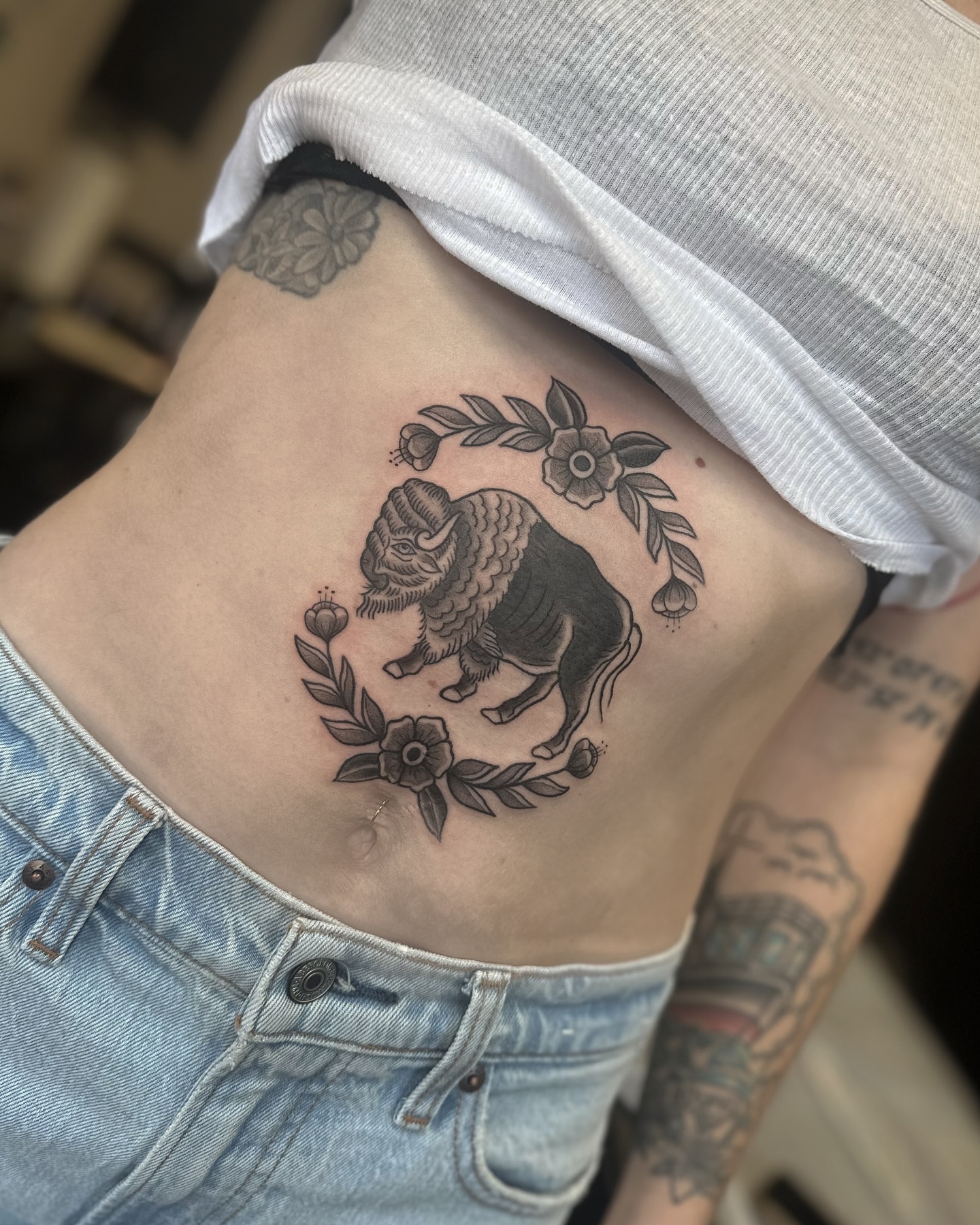 Buffalo American traditional tattoo on the ribs by Priscilla Michels