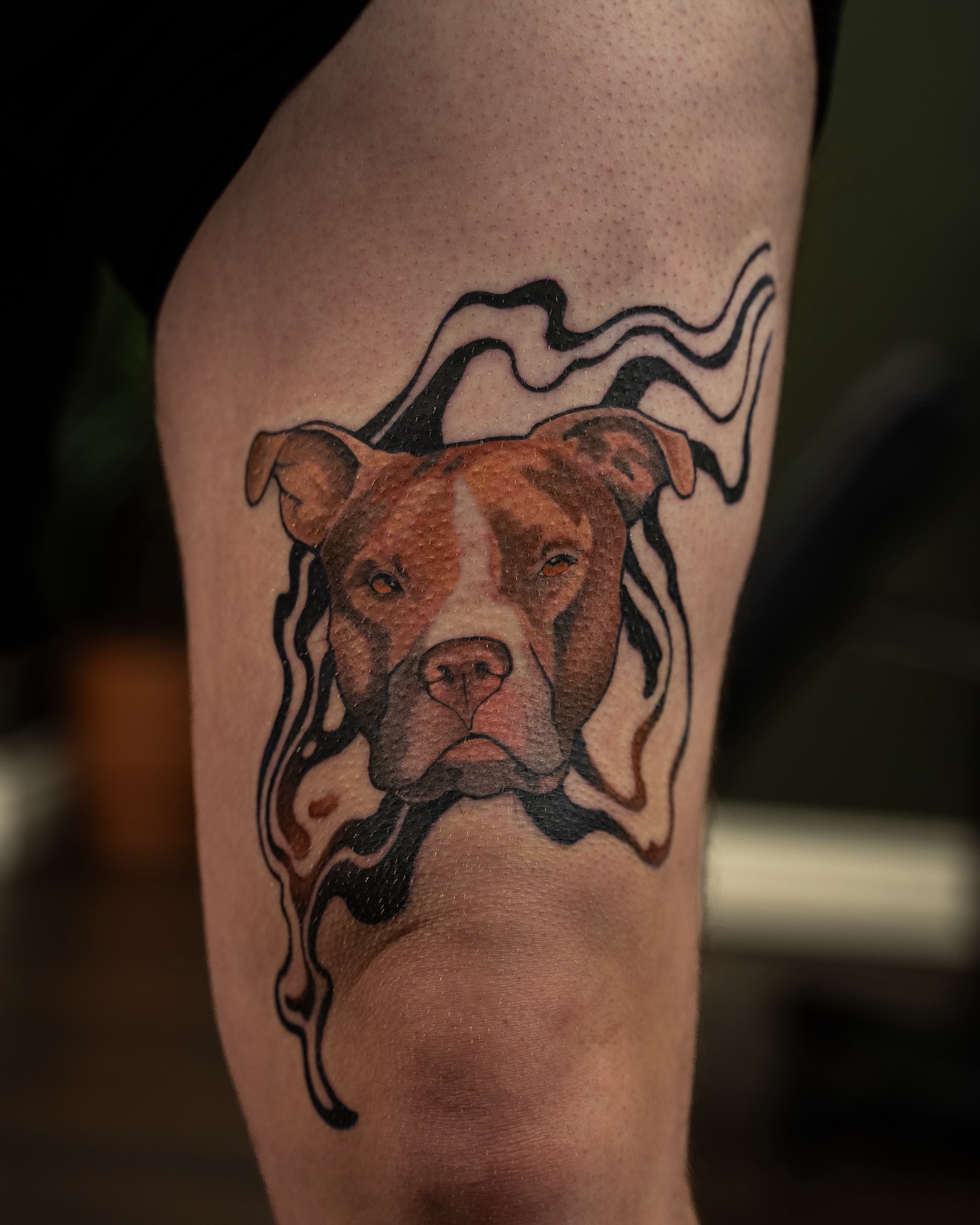 Pit bull realism tattoo on the thigh by Chris Estrada