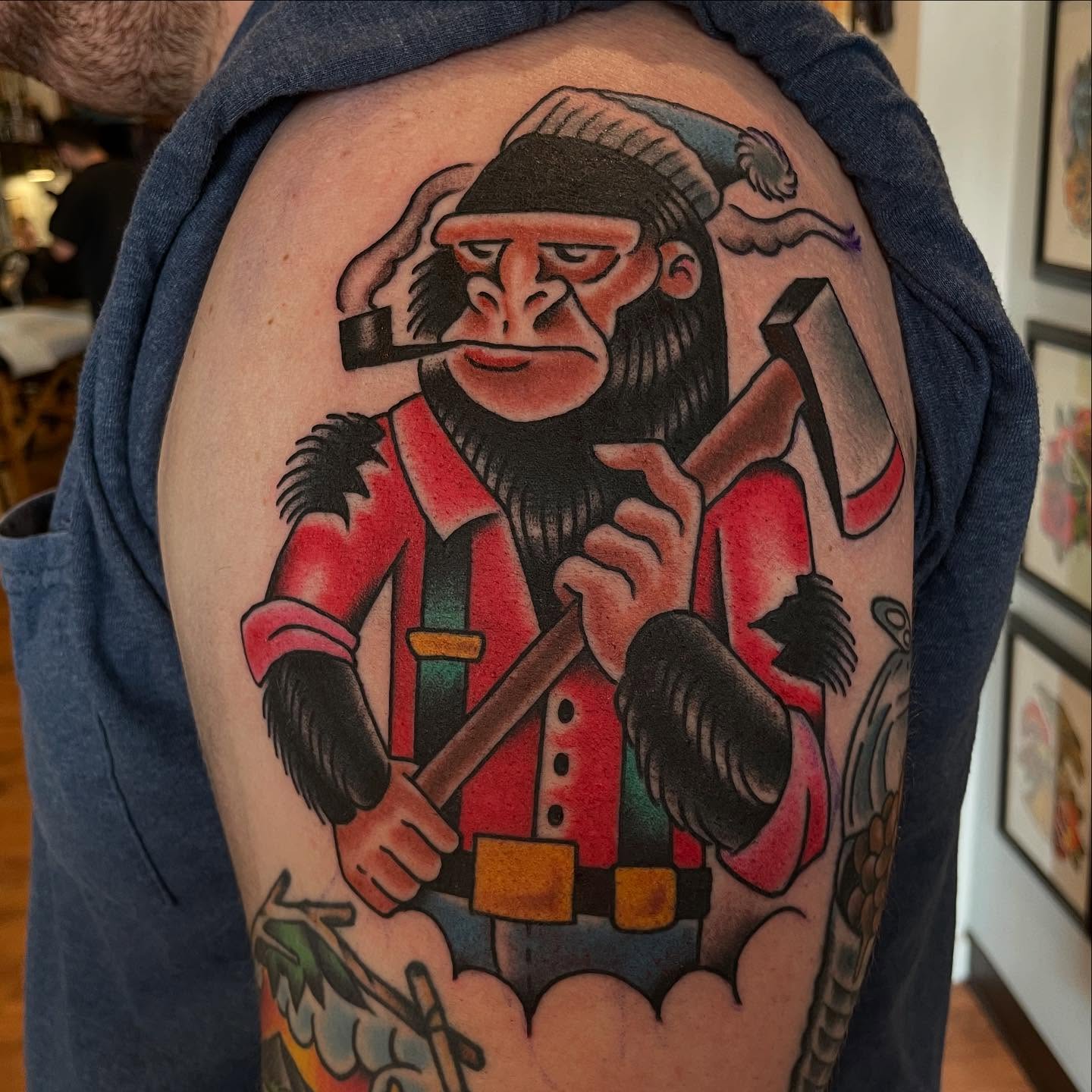 Monkey lumberjack American traditional tattoo on the shoulder by Grandma Approved, Chicago, Illinois