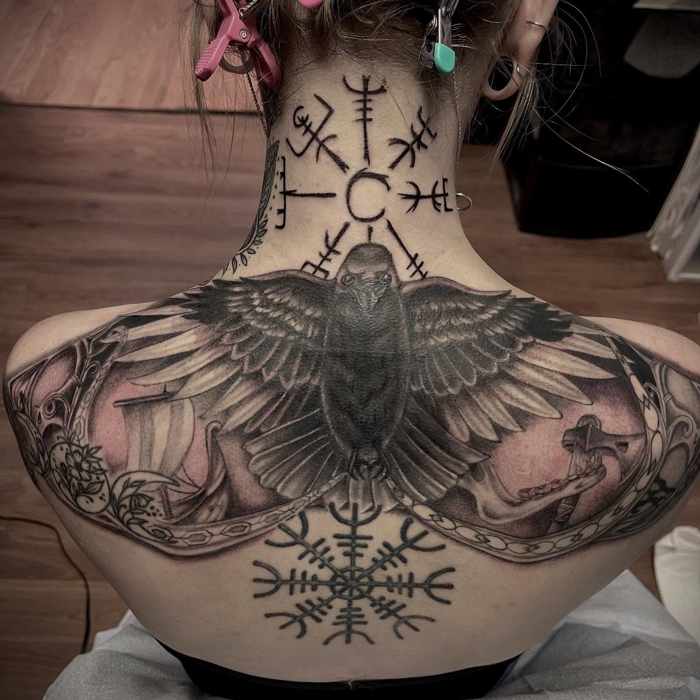 Raven and viking symbols realism tattoo on the neck by Ashly Hutchens, Richmond, Virginia