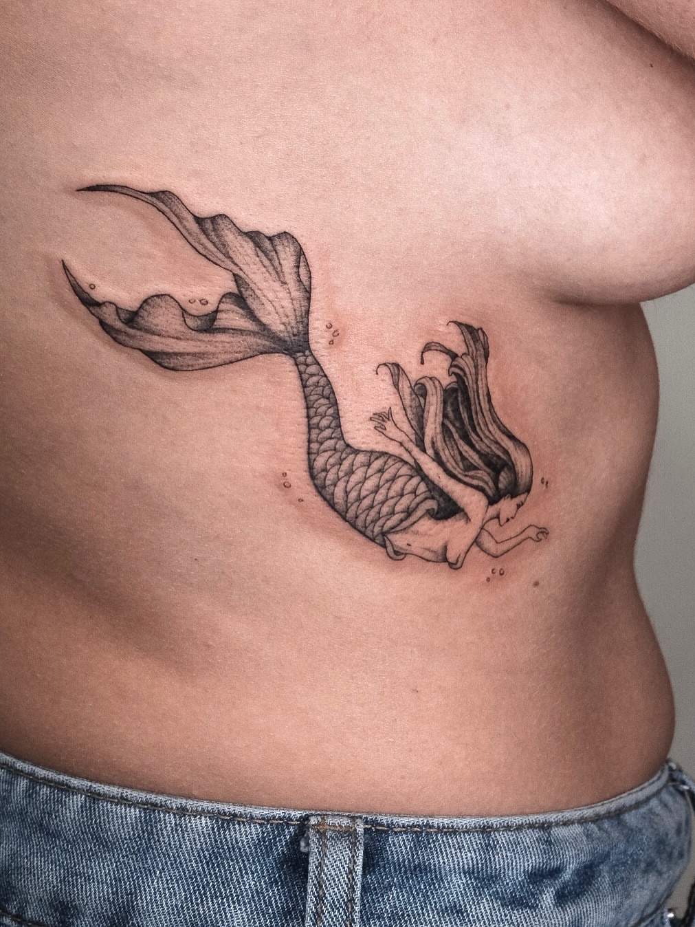 Mermaid black and grey tattoo on the ribs by Your tattoo Artist, New York, New York