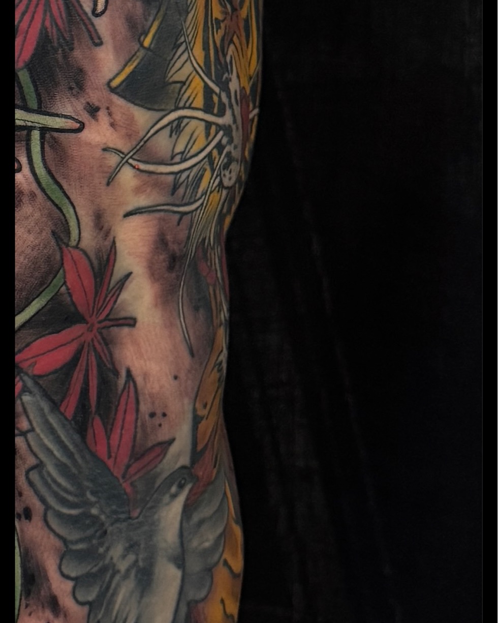 Bird and flowers American traditional tattoo on the forearm by Las Vegas Japanese Tattoo Artist, Las Vegas, Nevada