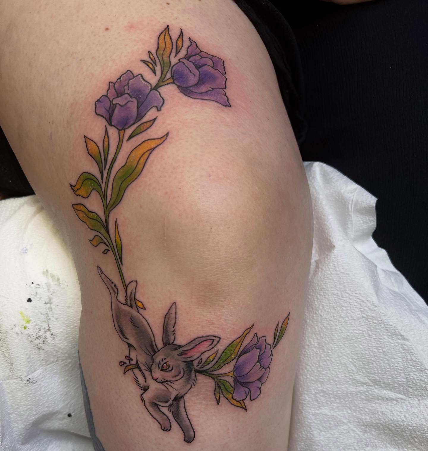 Rabbit and flowers new school tattoo on the thigh by Tattoos by Ash, Crystal Lake, Illinois