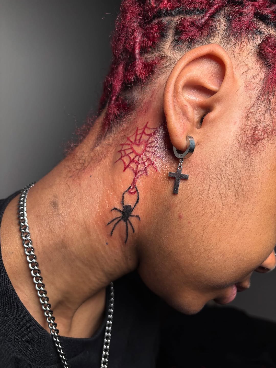 Spider and web blackwork tattoo on the neck by Mc X Happo