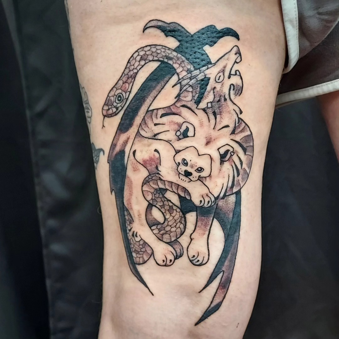 Dragon American traditional tattoo on the forearm by Spike Cameron