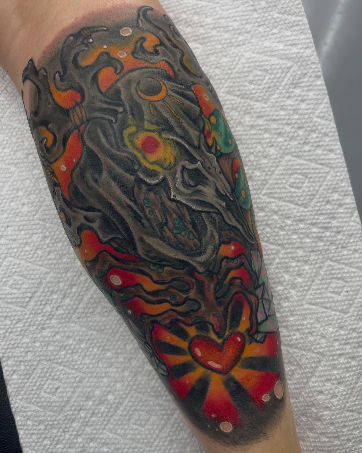 Abstract flame new school tattoo on the forearm by Autumn Fulford