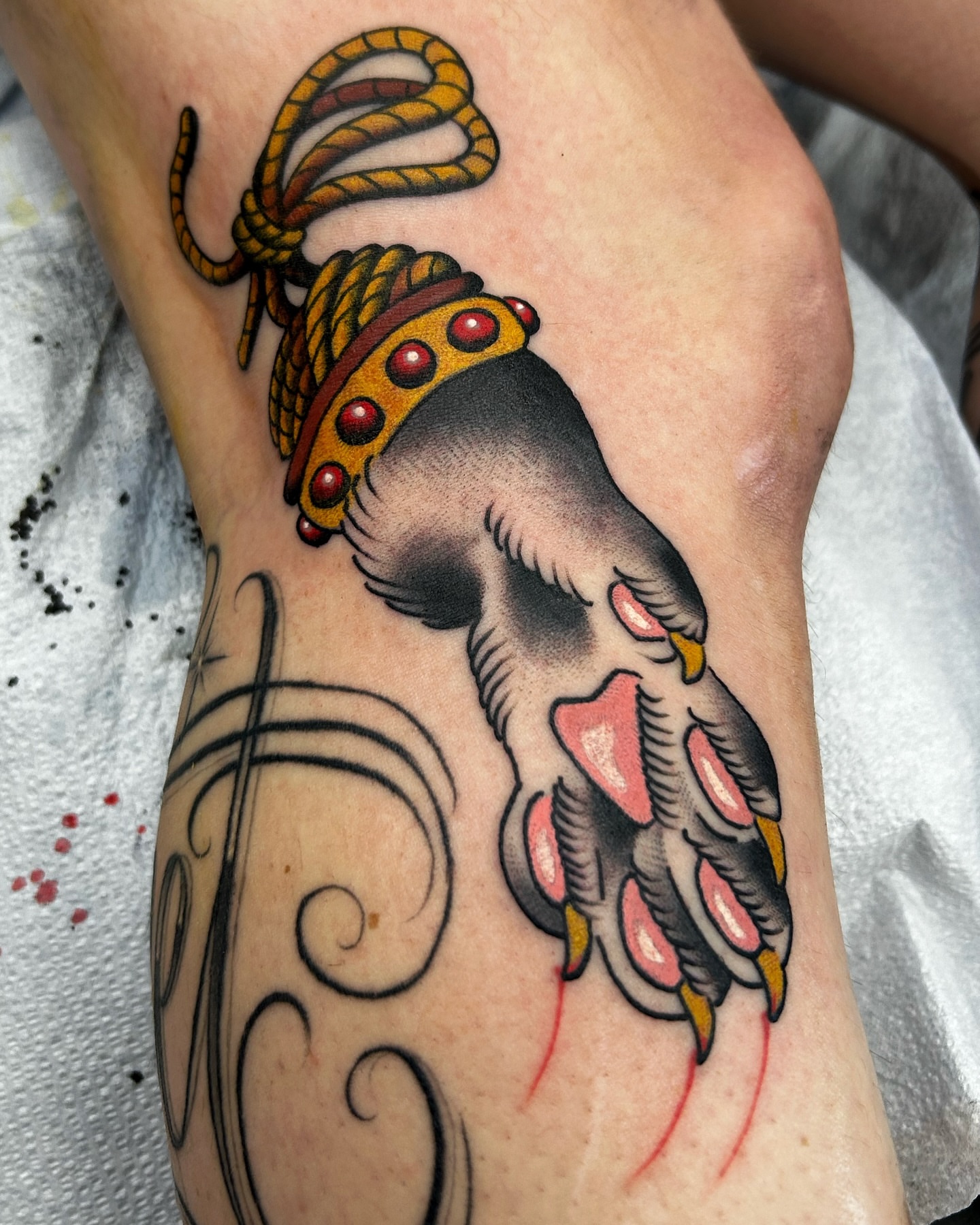 Hand with crown American traditional tattoo on the forearm by Jade McKenzie, Temecula, California