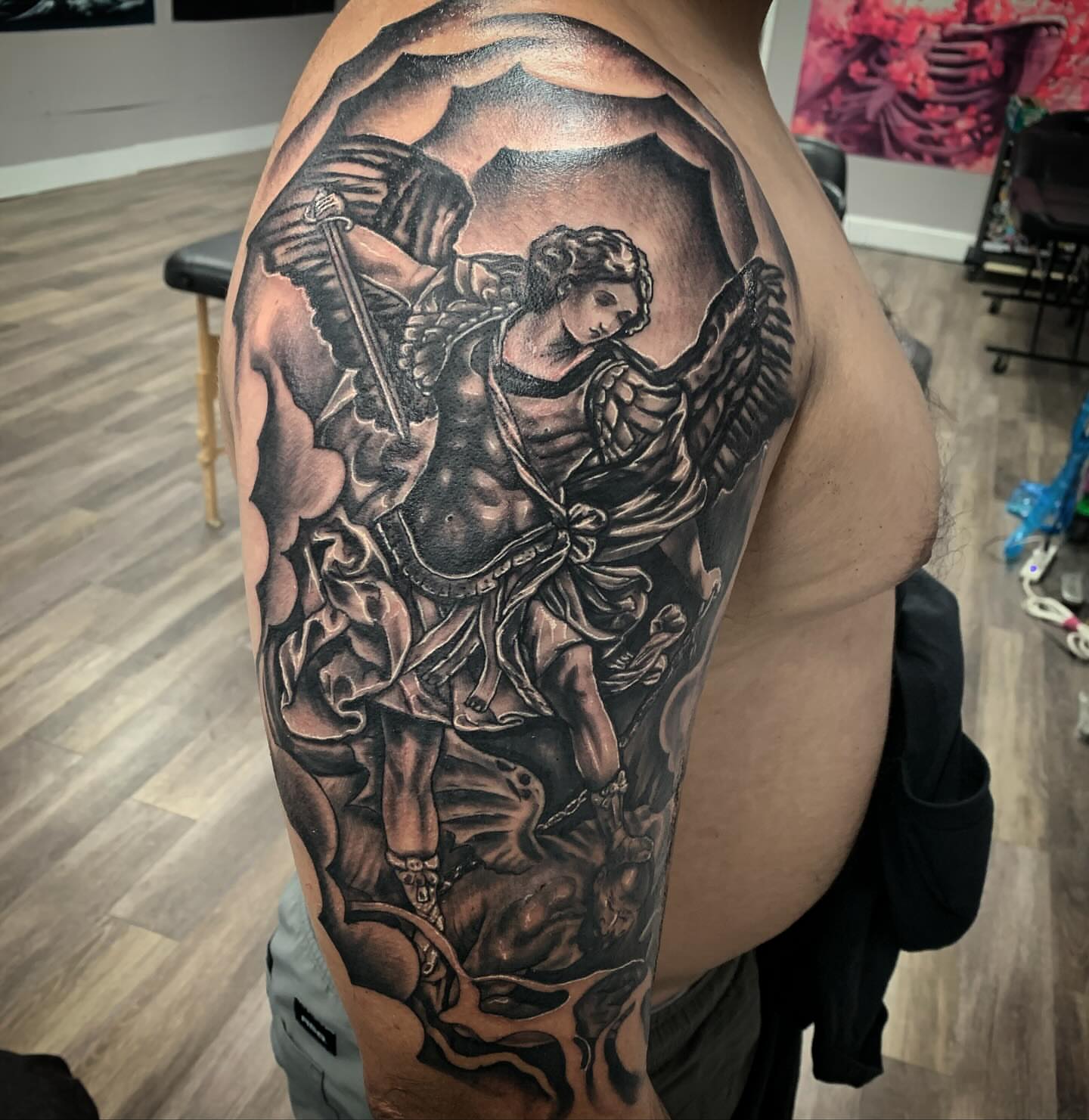Angel with sword realism tattoo on the shoulder by Tonii Florrez