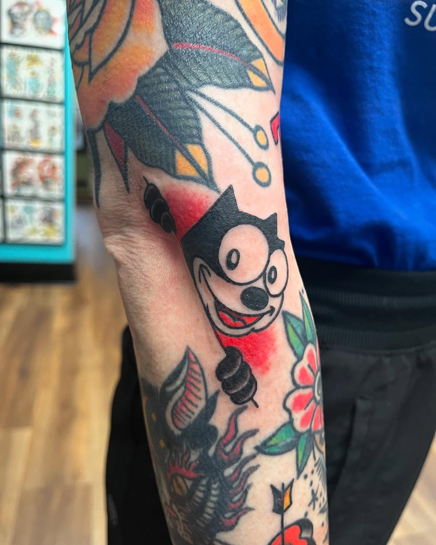 Felix the cat American traditional tattoo on the forearm by Brian Mcfadden
