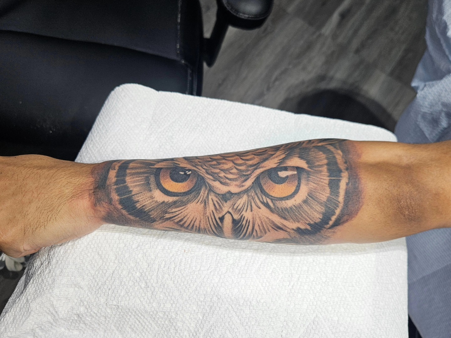 Owl realism tattoo on the forearm by German Romero-Rendon