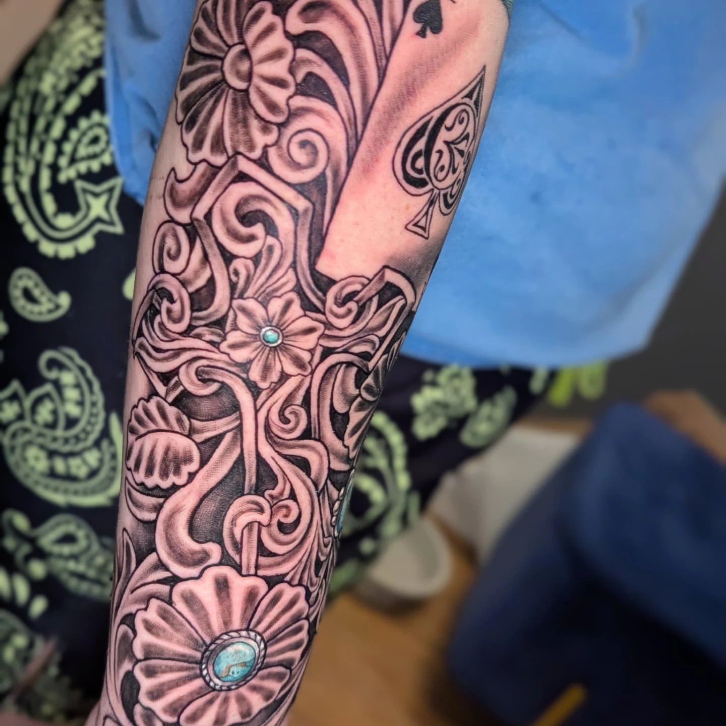 Floral design black and grey tattoo on the forearm by Bethany Jane Tattoos