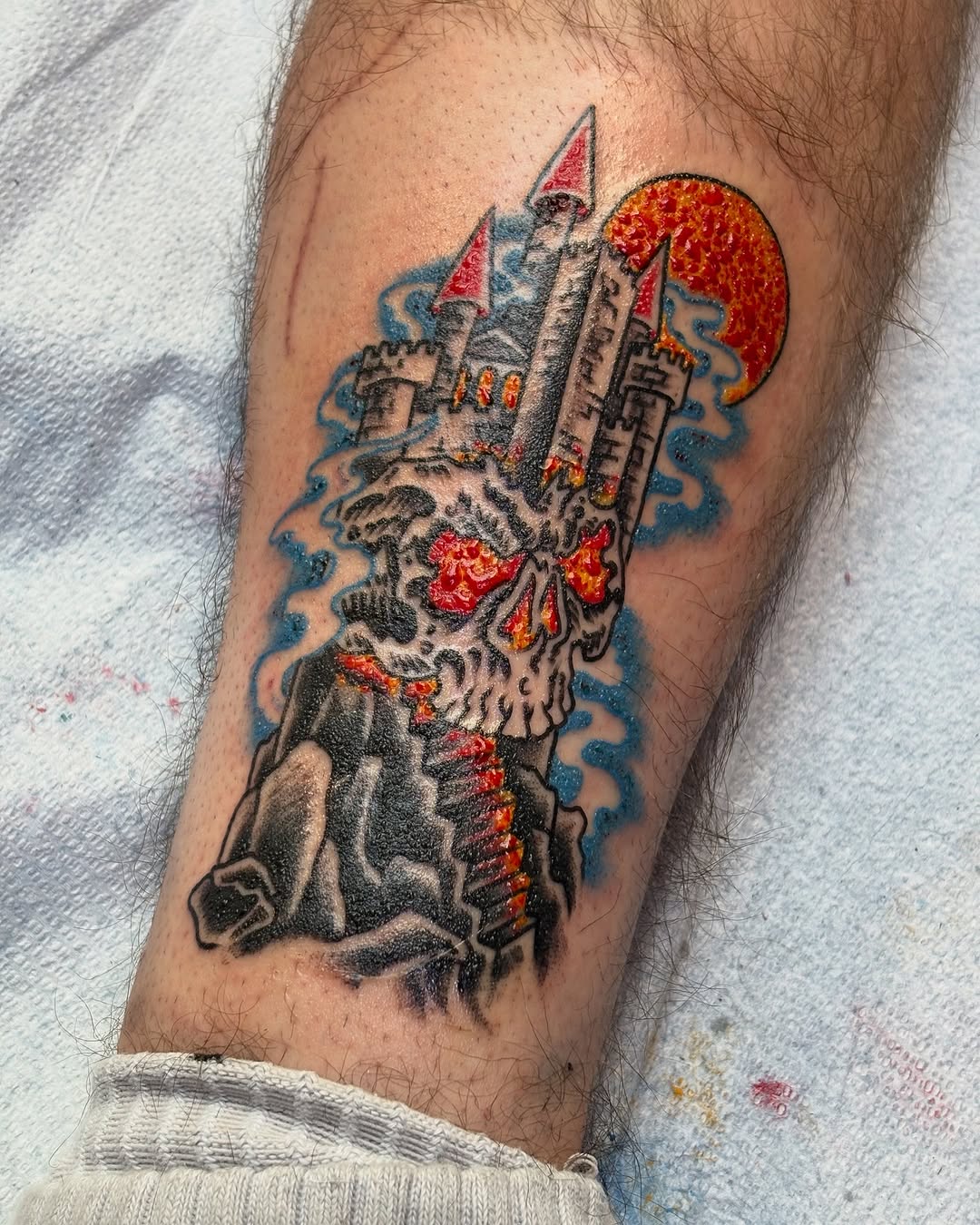 Skull castle and moon dark art tattoo on the forearm by Gabi Elia