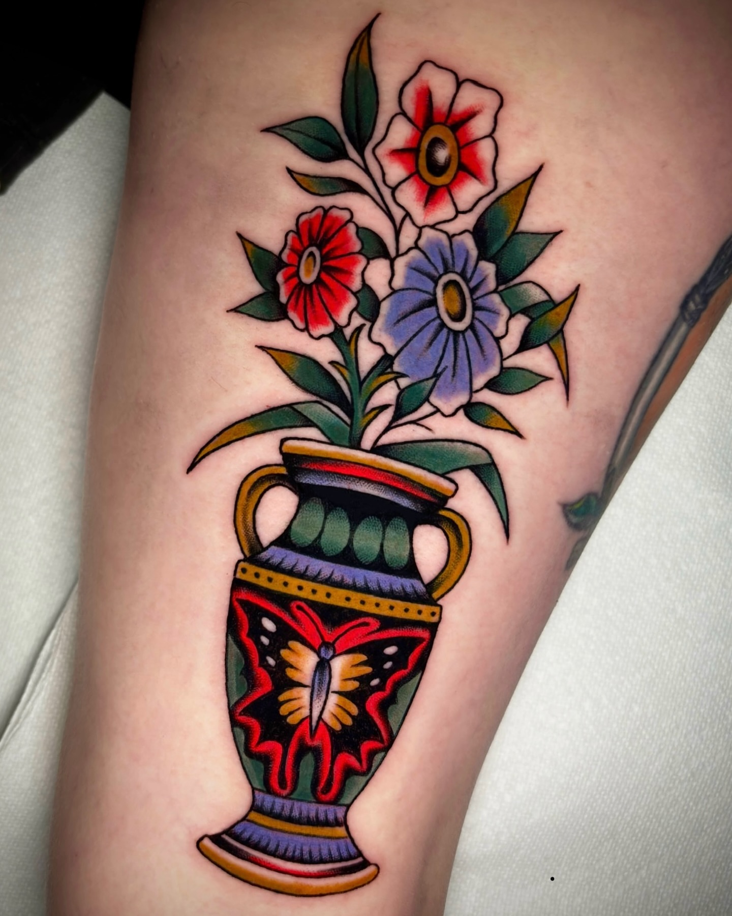 Flower vase American traditional tattoo on the forearm by Matt Elliott, Murfreesboro, Tennessee