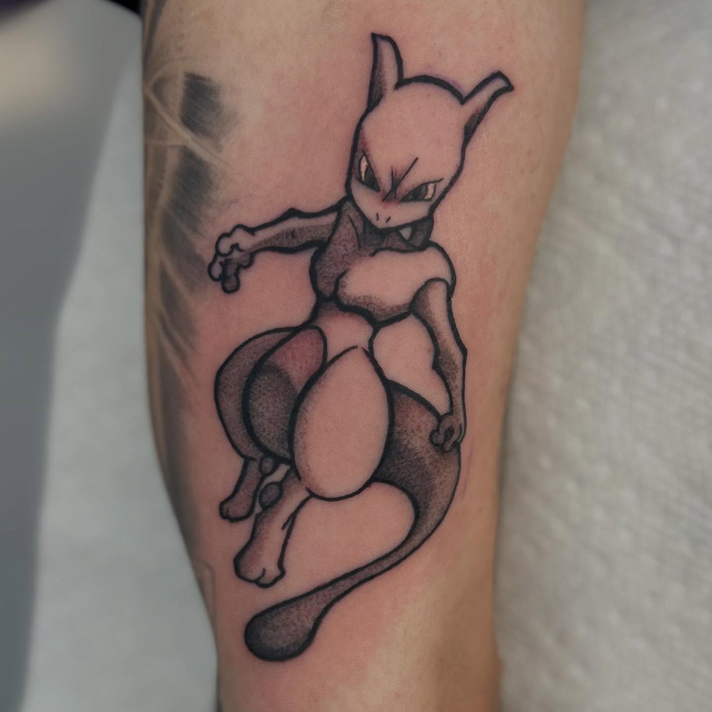 Mewtwo black and grey tattoo on the forearm by Abby Watts, Columbus, Ohio