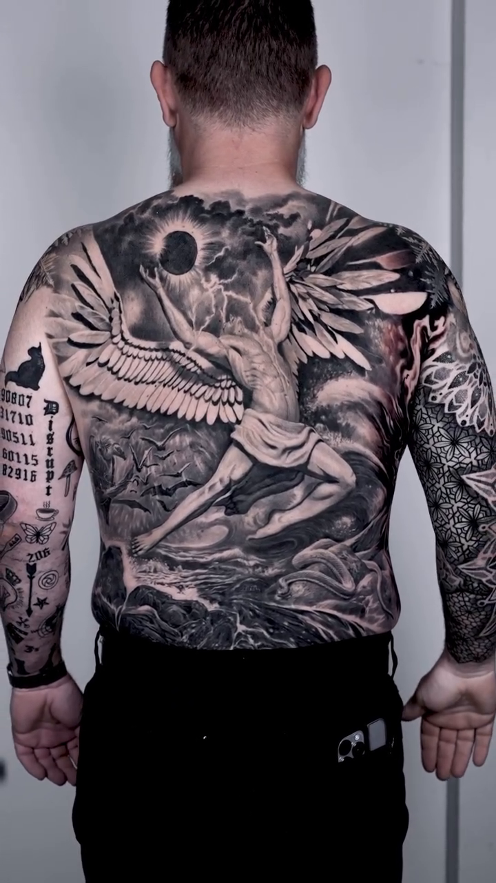 Angel with skull and binary code realism tattoo by Lynn Hoang, Honolulu, Hawaii