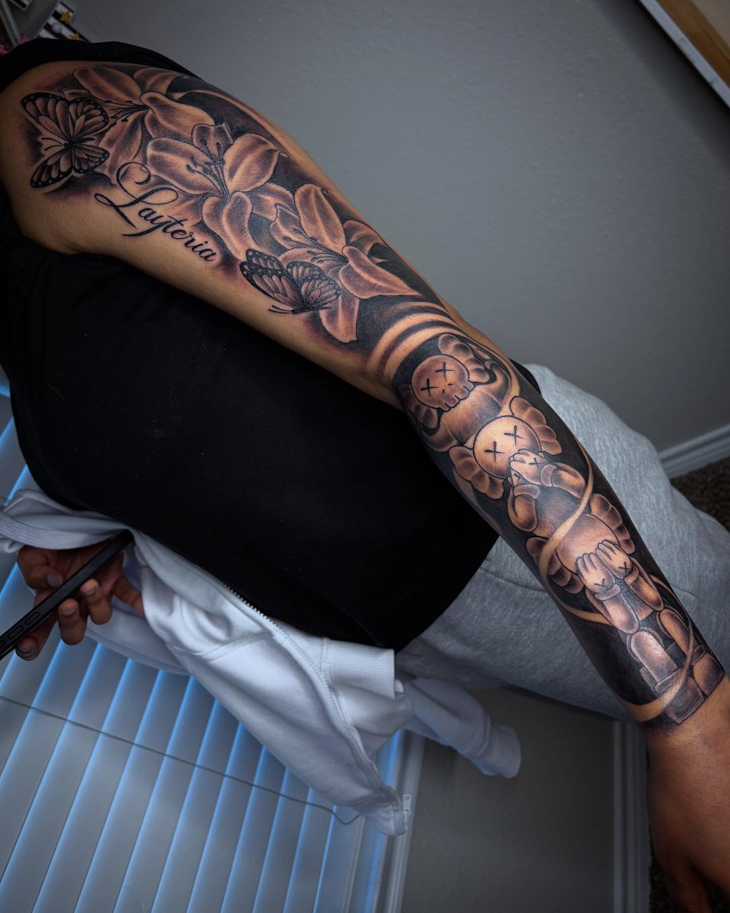 Flowers and butterflies realism tattoo on the forearm by ✧ Dallas Tattoo Artist  ✧