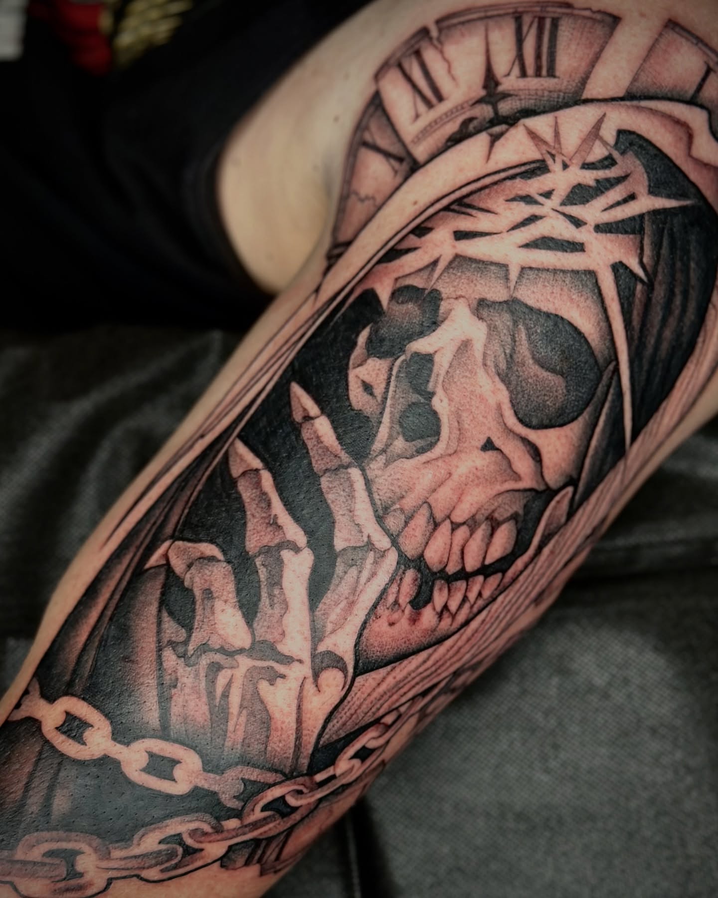 Skull with crown of thorns dark realism tattoo on the forearm by Feliz Manzanedo, Prescott, Arizona