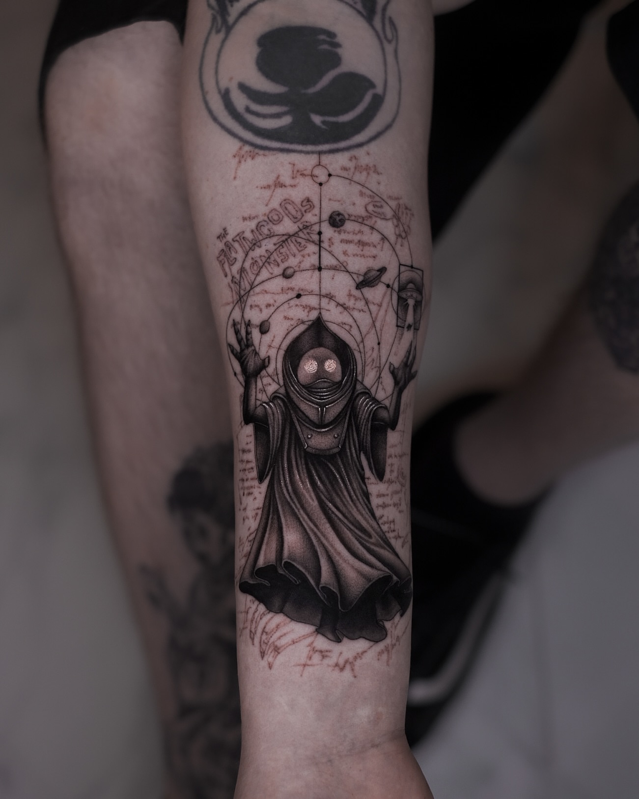 Astronaut with celestial map realism tattoo on the forearm by Oleksandr Moroz