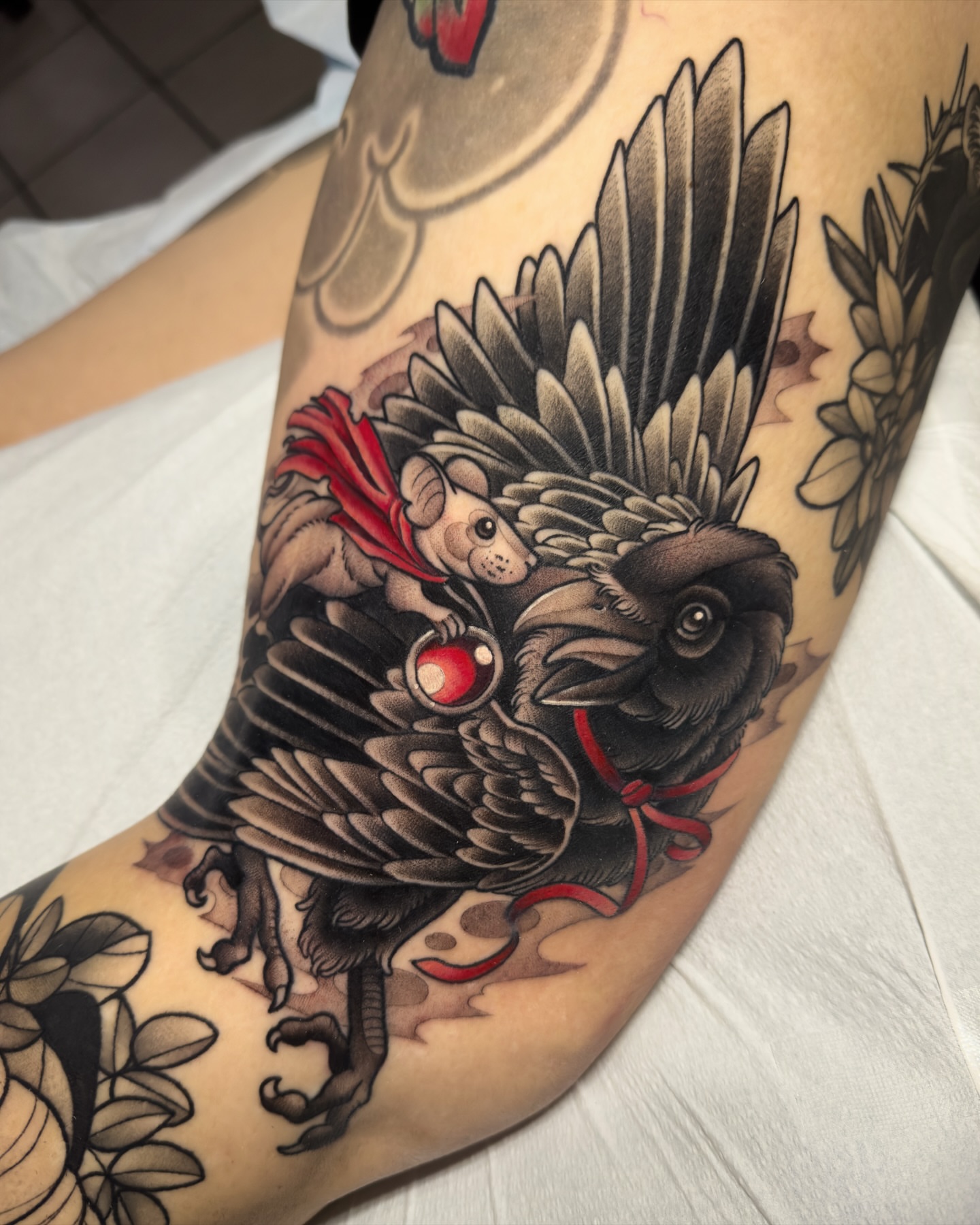 Crow and mouse American traditional tattoo on the forearm by Amy Jean, Minneapolis, Minnesota