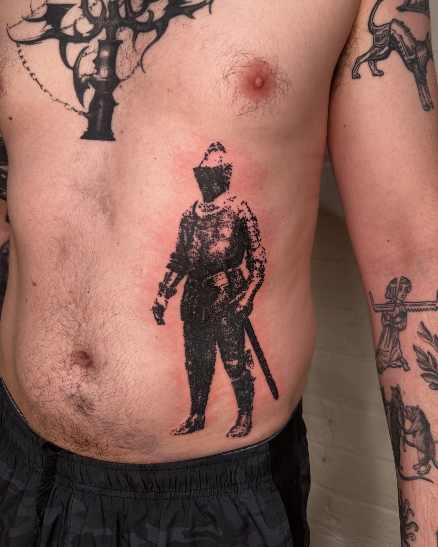 Soldier with helmet black and grey tattoo on the torso by πΈππππππ
