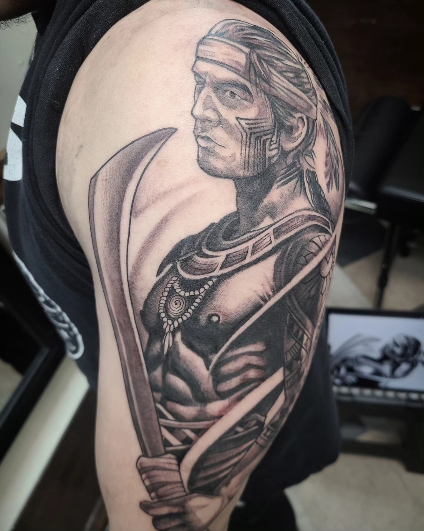 Warrior realism tattoo on the shoulder by David Vodicka