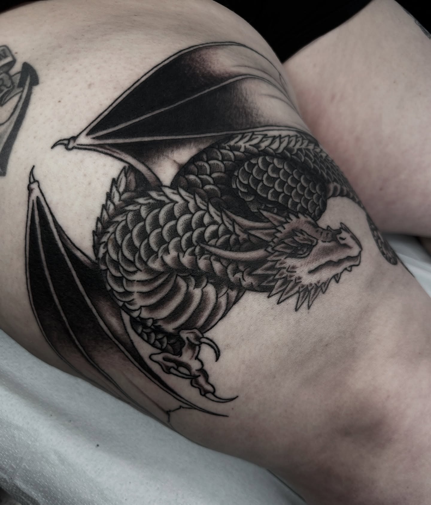 Dragon black and grey tattoo on the thigh by ππ¦π βπ¬π²π«π±π°