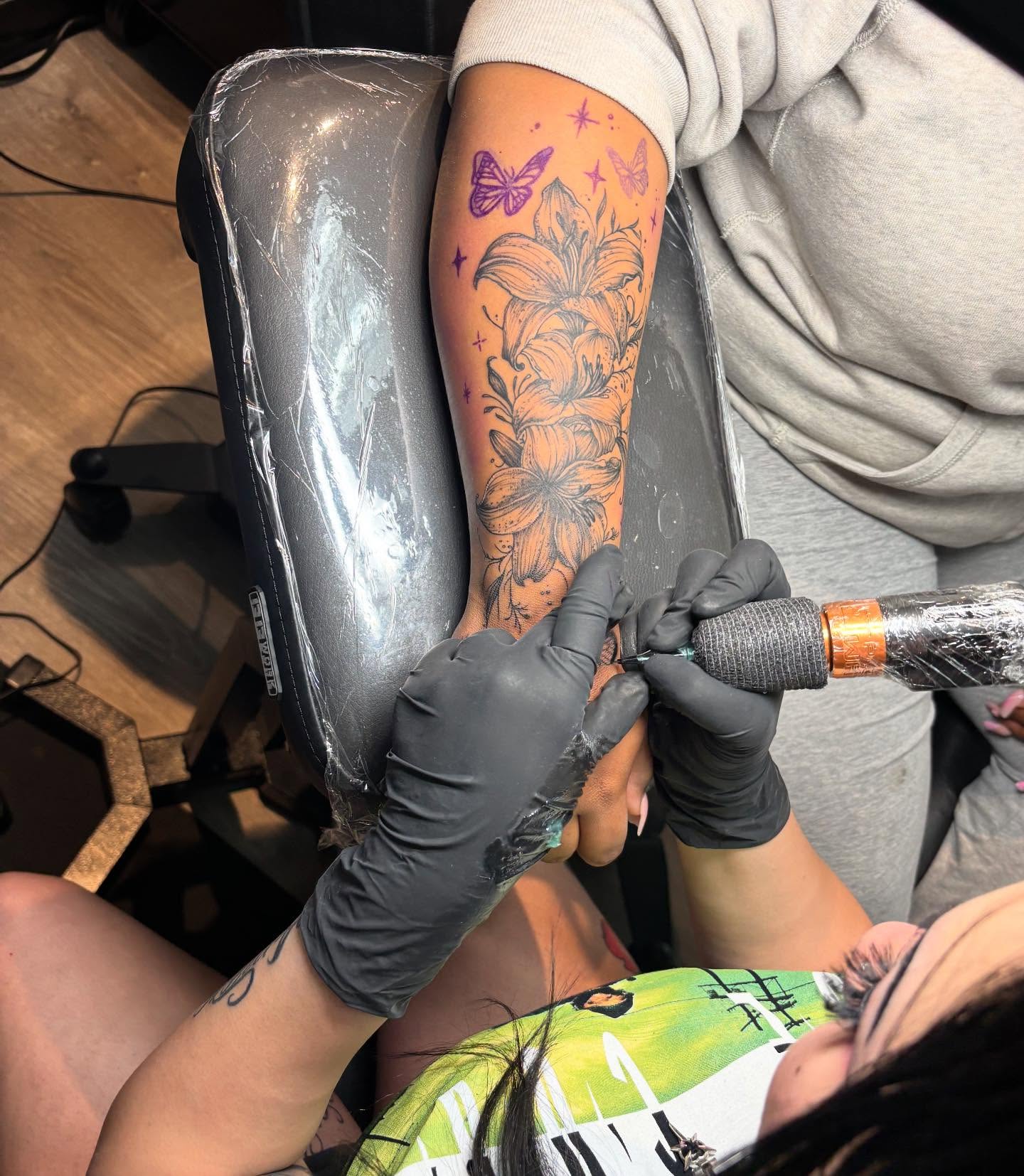 Lily flowers black and grey tattoo on the forearm by ππππππ