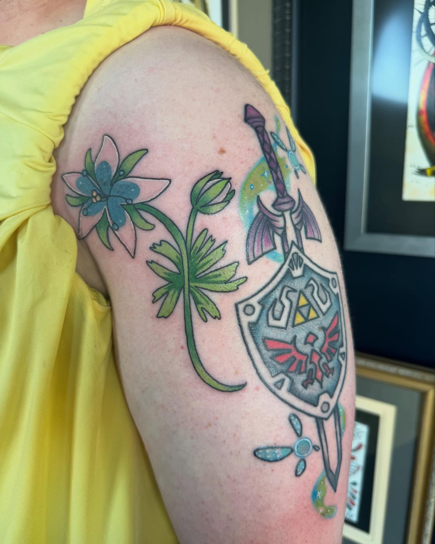 Zelda shield and sword American traditional tattoo on the shoulder by 👾 not ur baby’s ink 👾