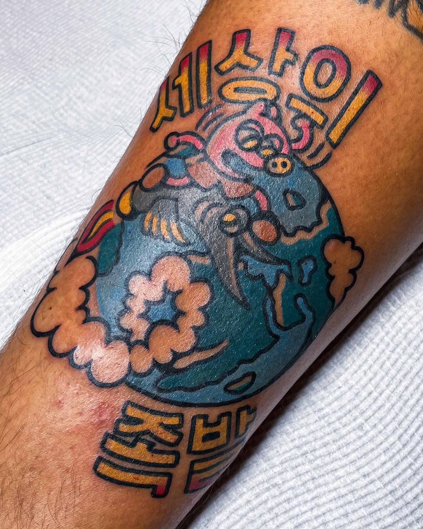 Pig and planet new school tattoo on the forearm by Oldschool Tattooer Takii 타키