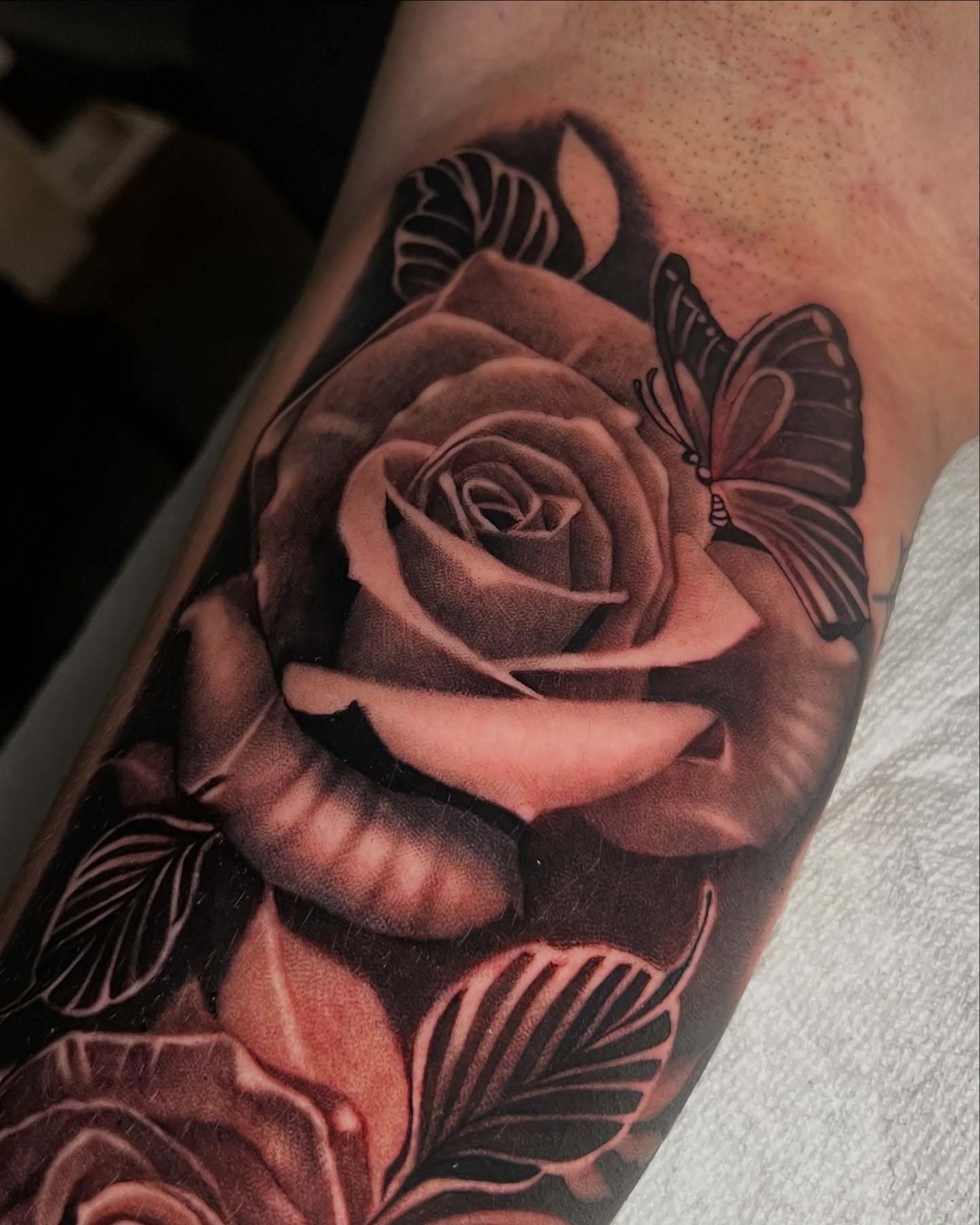 Rose realism tattoo on the forearm by Geo