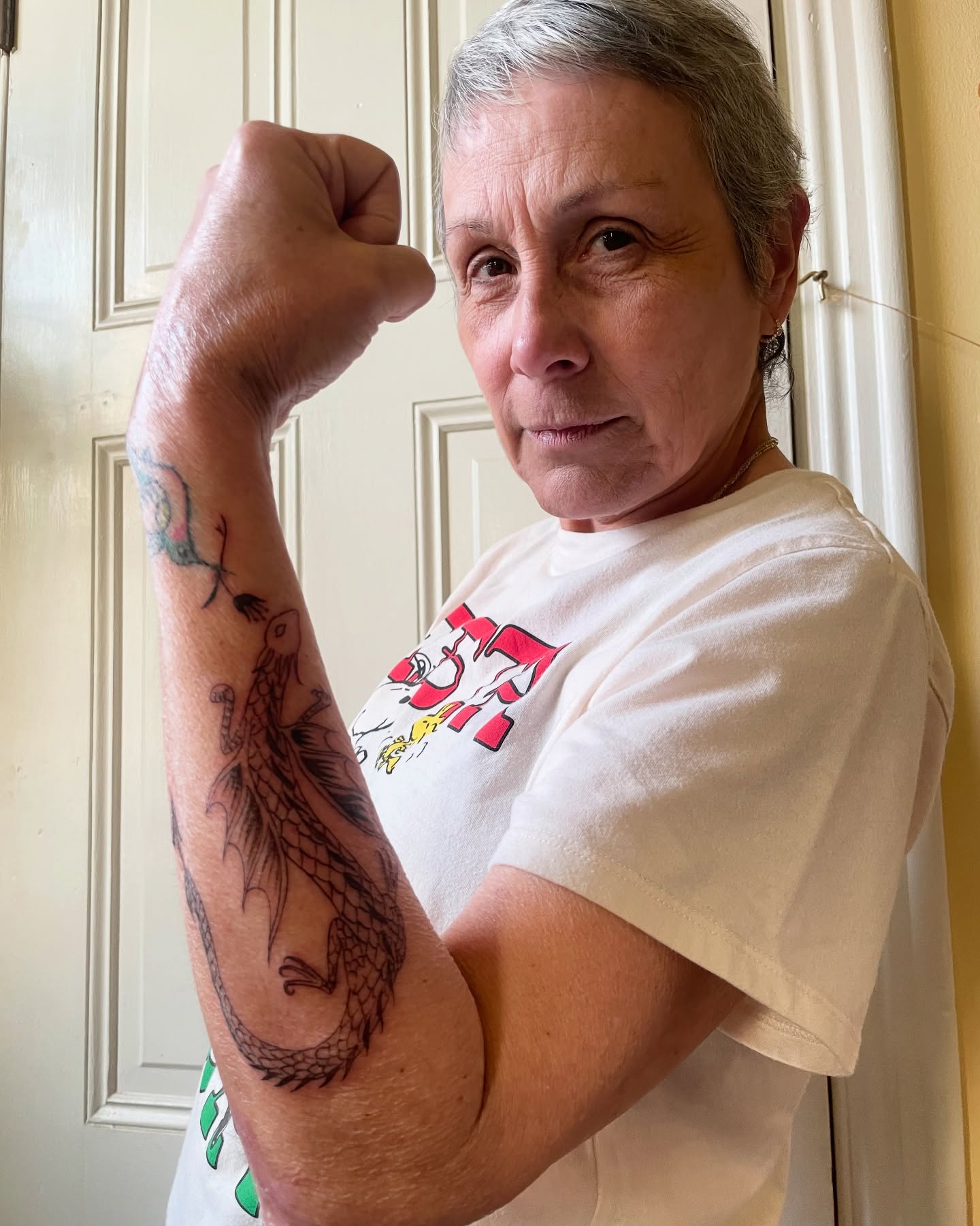 Dragon American traditional tattoo on the forearm by Steph Liebetreu