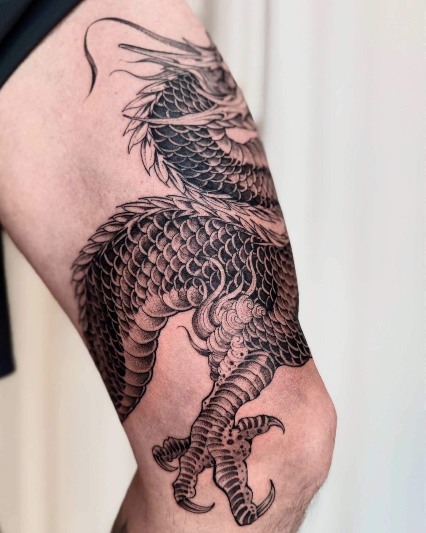 Dragon dotwork tattoo on the forearm by Dung Ngo