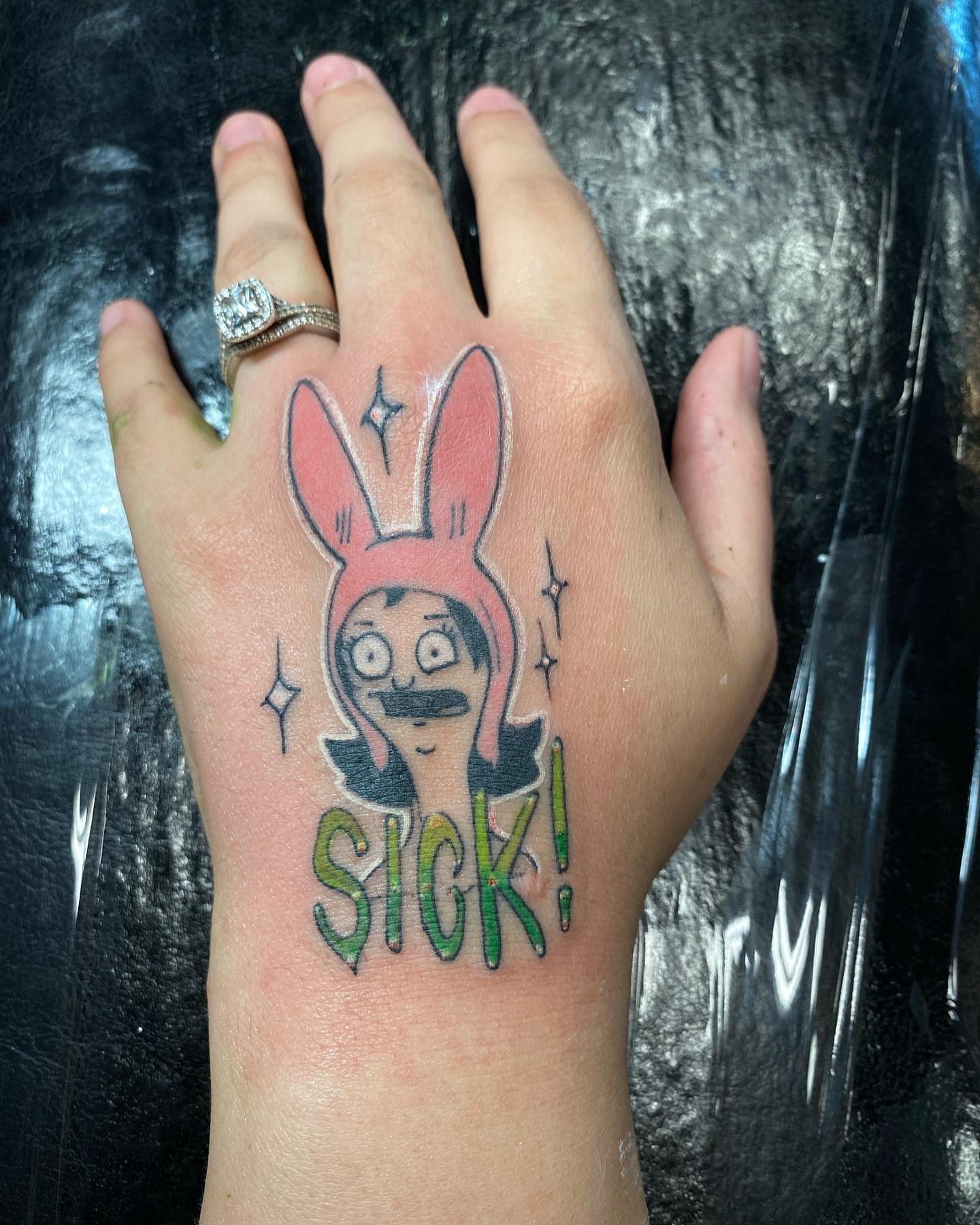 BMO dotwork tattoo on the hand by Tattsruru